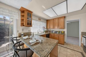 Kitchen with breakfast bar and dining area